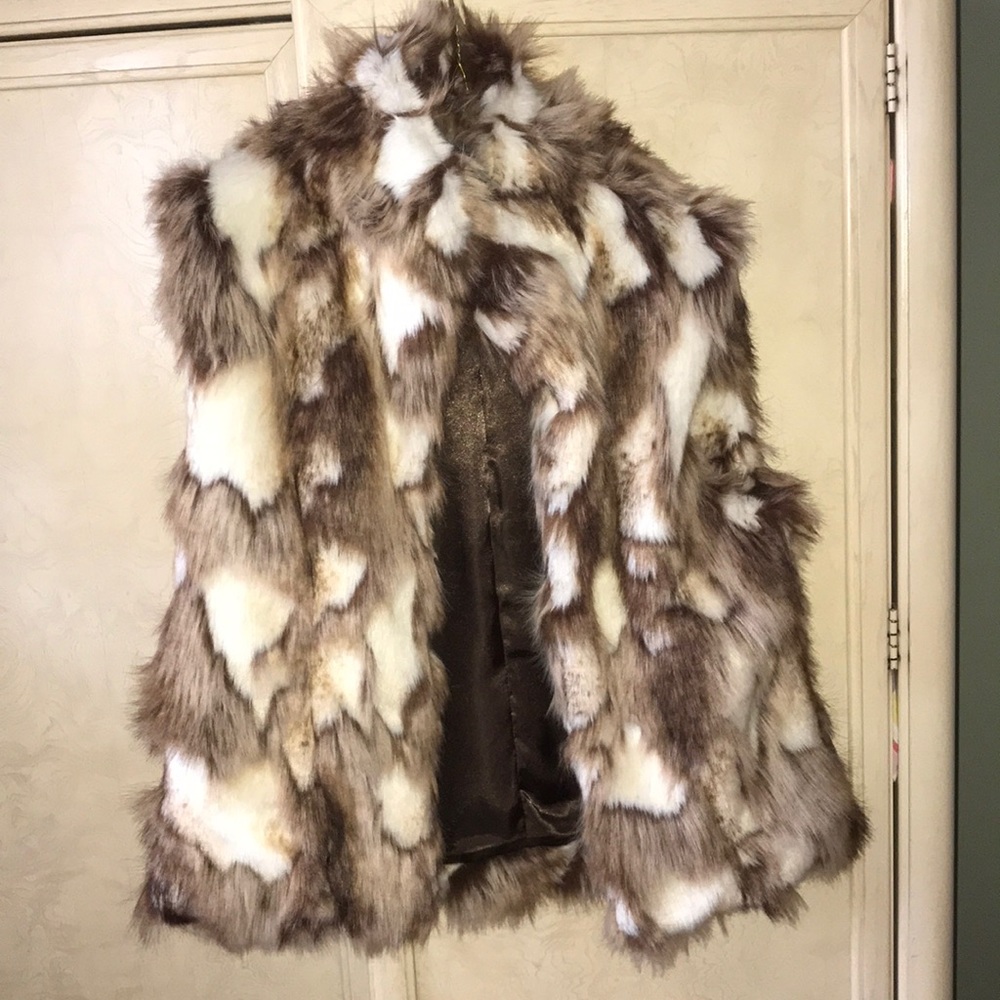 Fur vest super cozy and warm !  Dress up or down